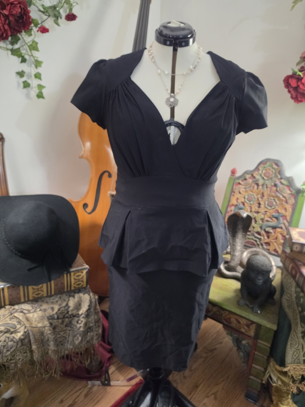 Stop Staring Black Peplum Midi Dress with V-Neck